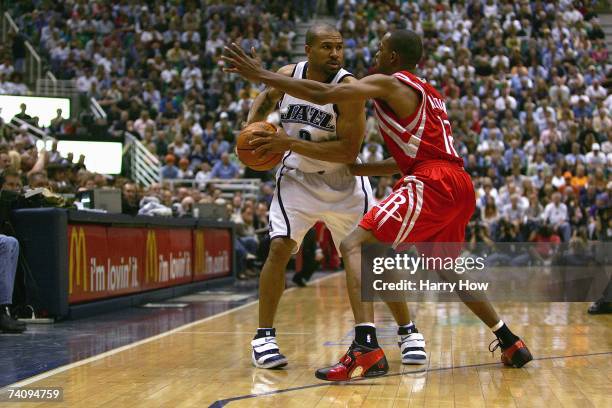 Derek Fisher of the Utah Jazz is defended by Rafer Alston of the Houston Rockets during Game Six of the Western Conference Quarterfinals during the...