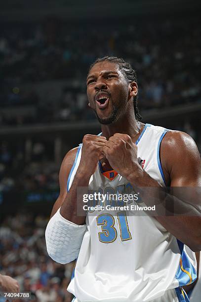 Nene of the Denver Nuggets reacts during the game against the San Antonio Spurs in Game Four of the Western Conference Quarterfinals during the 2007...