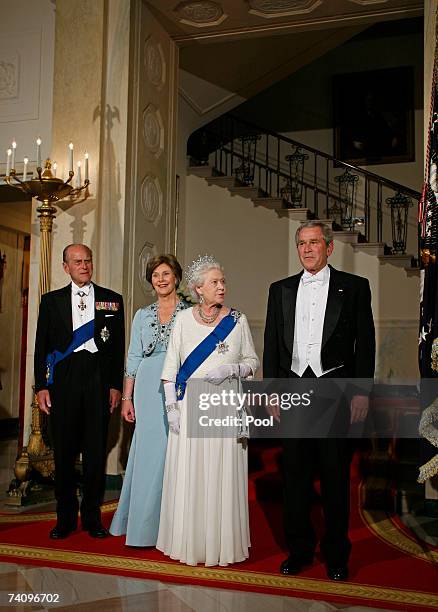 His Royal Highness Prince Philip, the Duke of Edinburgh, First Lady Laura Bush, Her Majesty Queen Elizabeth II and U.S. President George W. Bush pose...