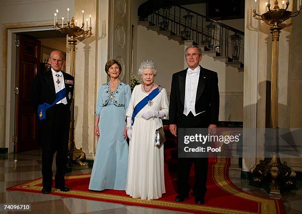 His Royal Highness Prince Philip, the Duke of Edinburgh, First Lady Laura Bush, Her Majesty Queen Elizabeth II and U.S. President George W. Bush pose...