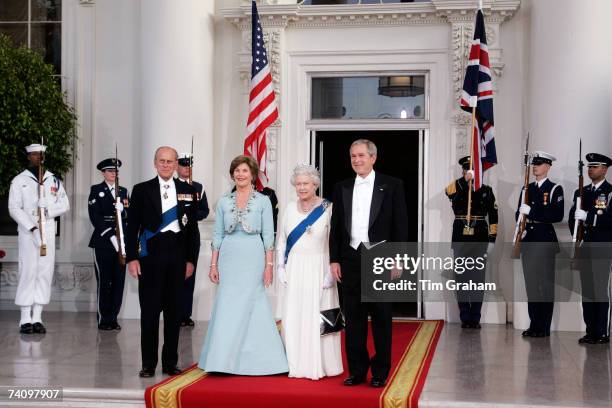 Queen Elizabeth II and Prince Philip, Duke of Edinburgh, with President George W Bush and his wife Laura Bush attend a State Dinner at the White...