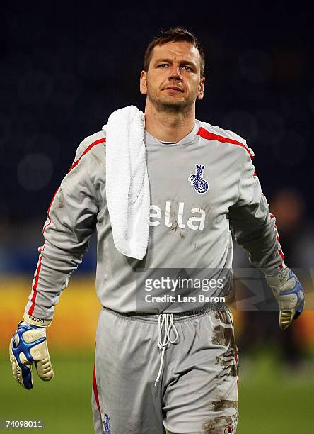 Goalkeeper Georg Koch of Duisburg looks dejected after losing the Second Bundesliga match between MSV Duisburg and 1. FC Cologne at the MSV Arena on...