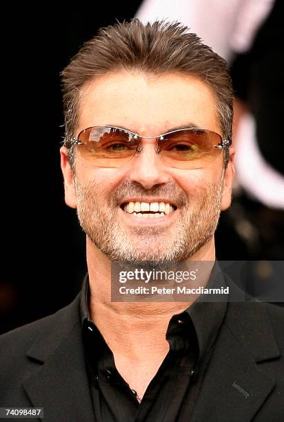 Former Wham! singer George Michael leaves Brent Magistrates Court after pleading guilty to a charge of driving while unfit through drugs on May 8,...