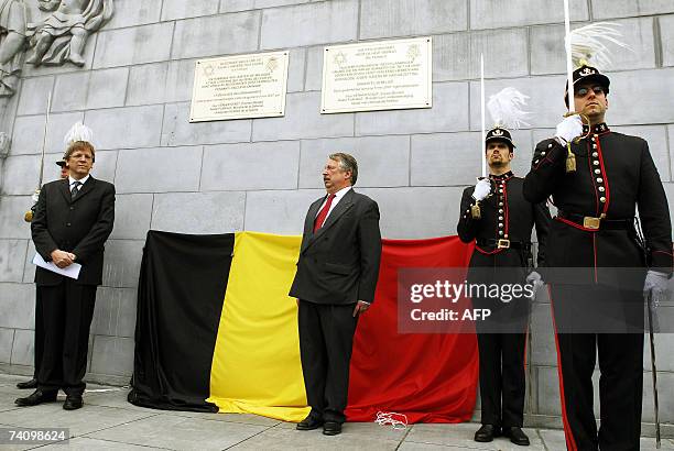 Belgian Prime Minister Guy Verhofstadt and Defence Minister Andre Flahaut attend the official opening of the tribute plate for so-called "righteous"...