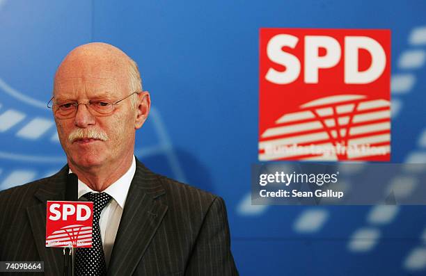 Peter Struck, head of the Bundestag faction of the German Social Democrats , speaks to the media upon his arrival for a meeting of SPD MPs at the...