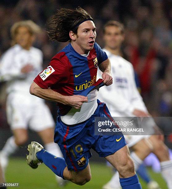 Barcelona's Leo Messi celebrate after scoring against Real Madrid during a Spanish league football match at the Camp Nou stadium in Barcelona, 10...