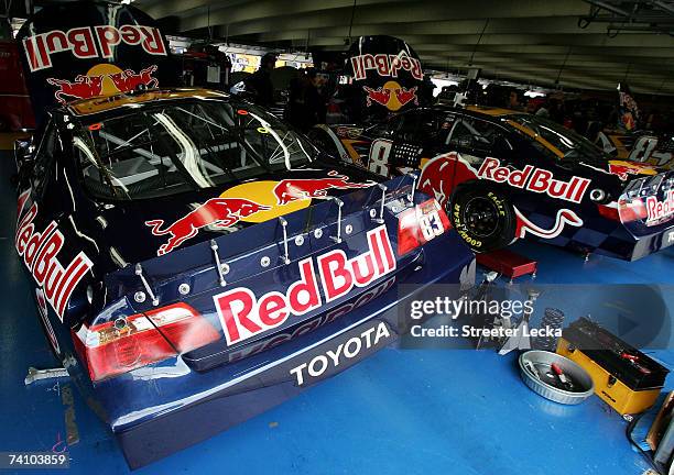 The test cars of Brian Vickers, driver of the Red Bull Toyota, sit in the garage area during NASCAR Nextel Cup testing at Lowe's Motor Speedway on...