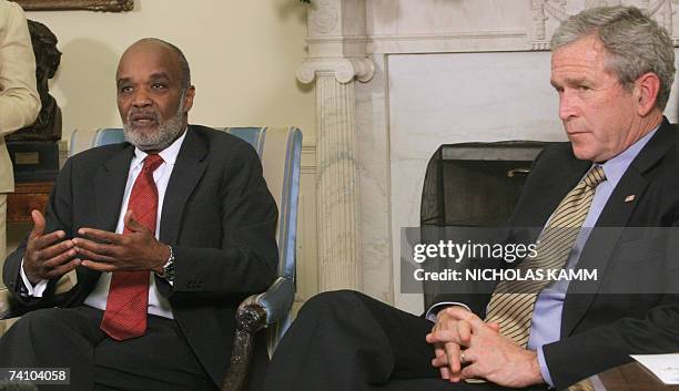 Washington, UNITED STATES: Haitian President Rene Preval speaks to the press at the end of a meeting with his US counterpart George W. Bush in the...