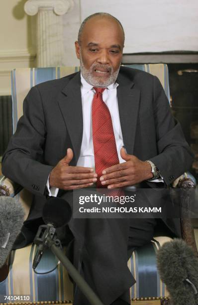 Washington, UNITED STATES: Haitian President Rene Preval speaks to the press after his meeting with his US counterpart George W. Bush in the Oval...