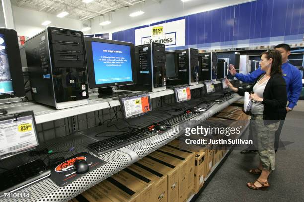Best Buy customer looks at a display of HP desktop computers at a Best Buy store May 8, 2007 in San Francisco, California. Computer maker...