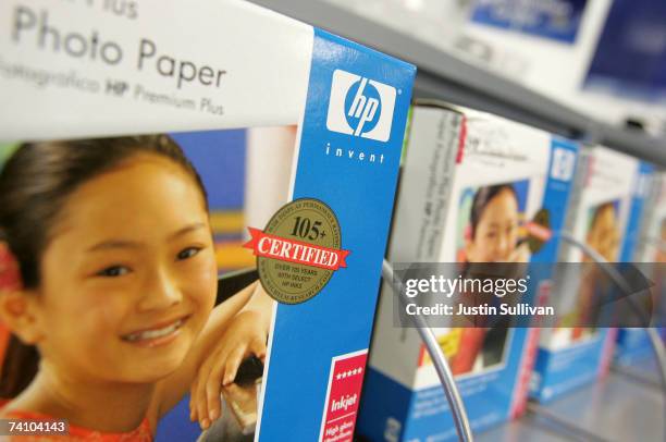 Packages of HP printer paper are displayed at a Best Buy store May 8, 2007 in San Francisco, California. Computer maker Hewlett-Packard raised its...