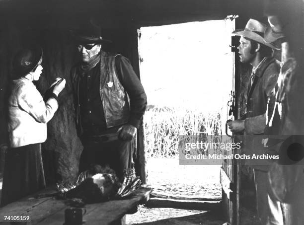 Actor John Wayne in Oscar Winning perfromance as Rooster Cogburn in scene from movie "True Grit" directed by Henry Hathaway. Film also features Kim...