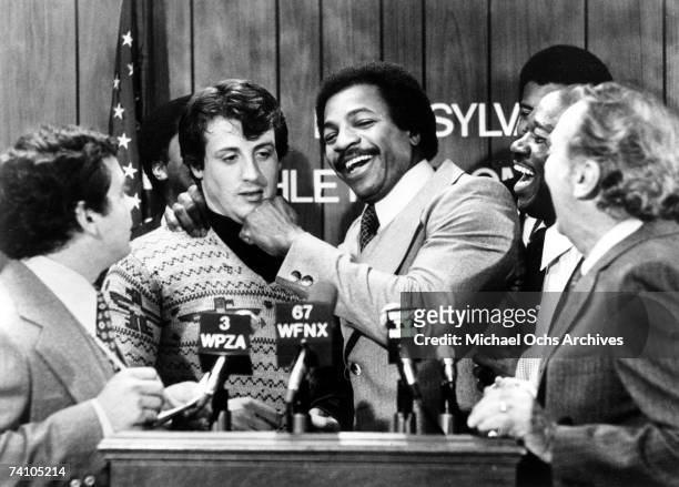 Actors Sylvester Stallone and Carl Weathers perform scene in movie "Rocky" directed by John G. Avildsen. "Rocky" won 3 Academy Awards.