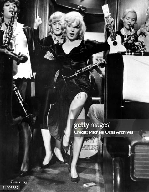 Actors Marilyn Monroe, Jack Lemmon and Tony Curtis perform a scene in movie "Some Like It Hot" directed by Billy Wilder. "Some Like It Hot" won an...