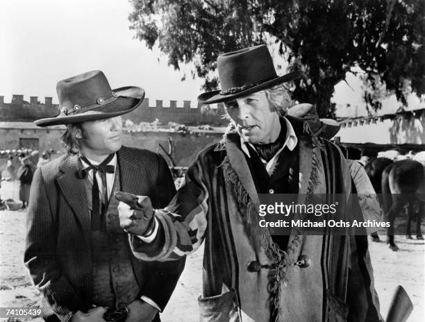 Actors Kris Kristofferson and James Coburn perform a scene in the movie "Pat Garrett and Billy The Kid" directed by Sam Peckinpah.