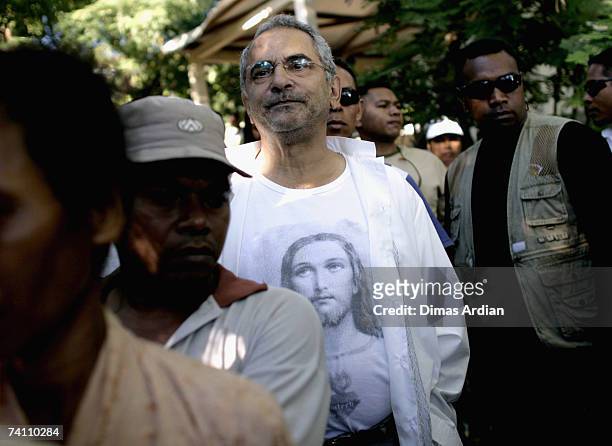 Presidential candidate Jose Ramos-Horta arrives at a polling station as East Timorese people vote in a runoff in the presidential election May 9,...