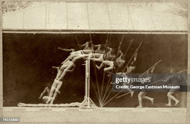 Chronophotographic study of a man as he pole vaults, early 1890s. The image features 11 exposures that show the man's body and pole position during...