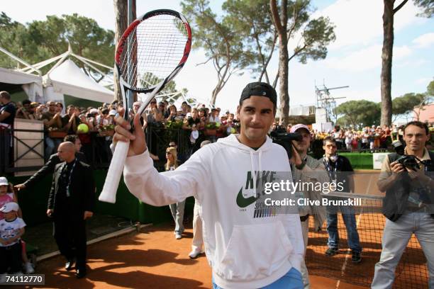 Roger Federer of Switzerland visits the young village for questions and hitting session with kids during the ATP Masters Series at the Foro Italico...