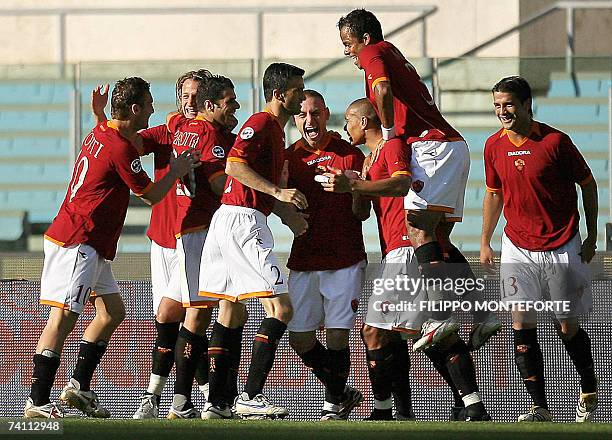 Roma's Daniele De Rossi jubilates with teamates after scoring against Inter Milan during their Coppa Italia first leg final football match at Rome's...