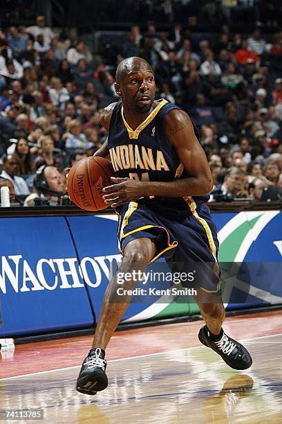 Darrell Armstrong of the Indiana Pacers looks to pass against the Charlotte Bobcats on April 6, 2007 at Charlotte Bobcats Arena in Charlotte, North...