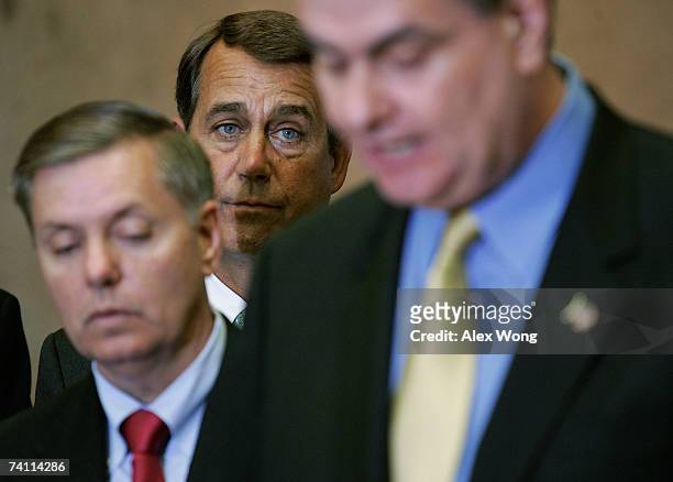 Sen. Lindsey Graham and House Minority Leader Rep. John Boehner listen as Executive Director of the Veterans of foreign Wars Bob Wallace speaks...