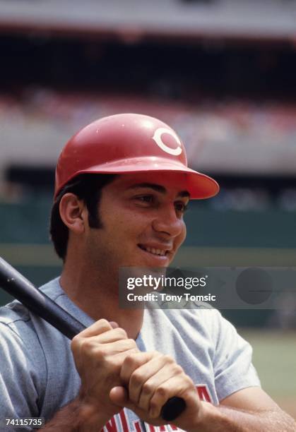 Catcher Johnny Bench of the Cincinnati Reds smiles as he awaits his turn in the batting cage prior to a July 1970 MLB game against the Pittsburgh...