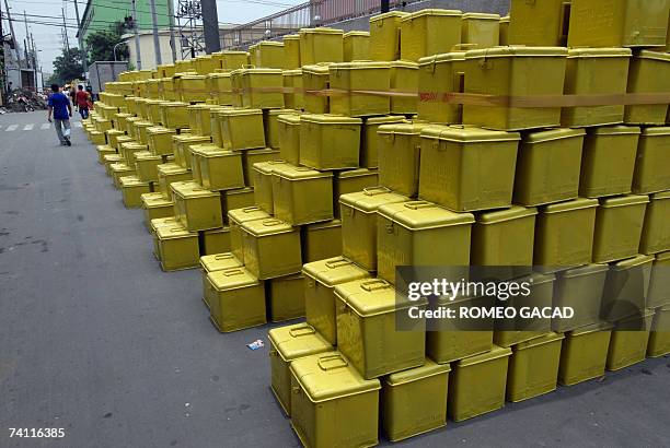 Stacks of ballot boxes are ready for distribution outside the Commission on Elections warehouse in Manila 10 May 2007 in preparation for the 14 May...