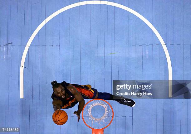 Baron Davis of the Golden State Warriors scores a layup against the Utah Jazz during the third quarter of the Western Conference Semifinals during...