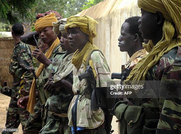 Picture taken 02 November 2006 shows children soldiers in the Chadian Army at Am Timan, southeastern Chad. The government of Chad and the UN...