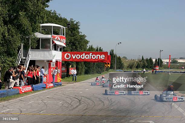 In this handout photograph provided by Vodafone, a general view of the action during the Vodafone Go-Karting Challenge prior to the Spanish Grand...