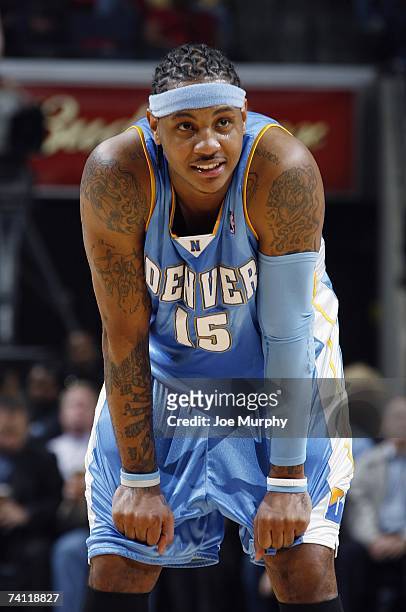 Carmelo Anthony of the Denver Nuggets stands on the court during the NBA game against the Memphis Grizzlies on April 14, 2007 at FedExForum in...