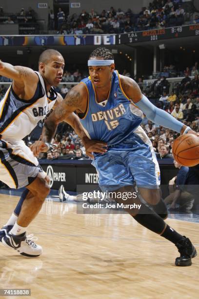 Carmelo Anthony of the Denver Nuggets drives around of the Memphis Grizzlies on April 14, 2007 at FedExForum in Memphis, Tennessee. NOTE TO USER:...