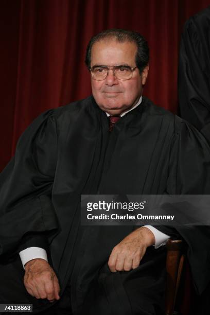 Associate Justice Antonin Scalia poses for photographers at the U.S. Supreme Court October 31, 2005 in Washington DC. Earlier in the day U.S....