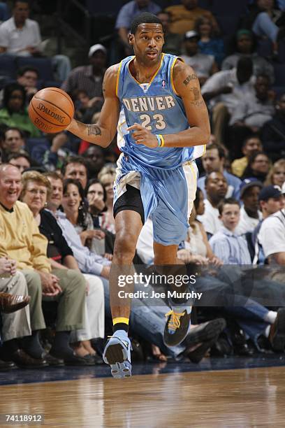 Marcus Camby of the Denver Nuggets moves the ball upcourt during the NBA game against the Memphis Grizzlies on April 14, 2007 at FedExForum in...