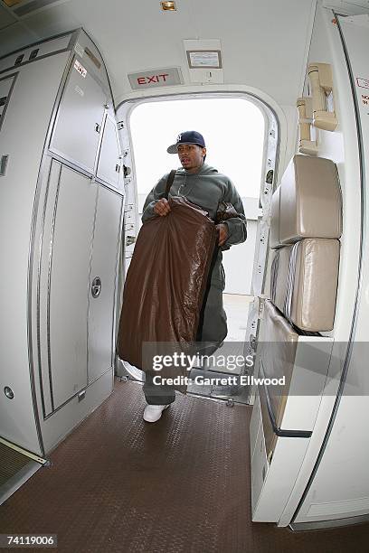 Allen Iverson of the Denver Nuggets walks on to the plane for the team charter traveling from Denver to San Antonio, Texas for Game One of the...