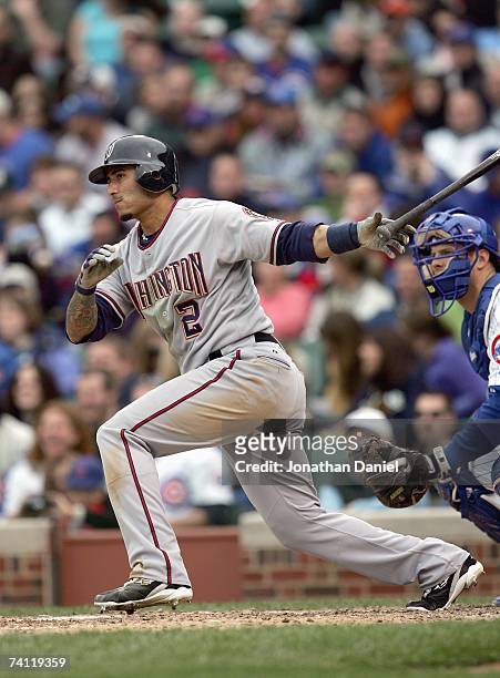 Felipe Lopez of the Washington Nationals swings at the pitch against the Chicago Cubs on May 5, 2007 at Wrigley Field in Chicago, Illinois. The Cubs...