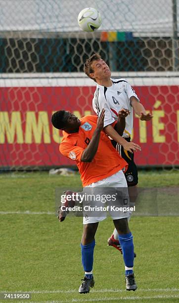 Genero Zeefunk of the Netherlands and Marvin Pachan of Germany go up for a header during the 2007 UEFA European Under 17 Championship fifth place...