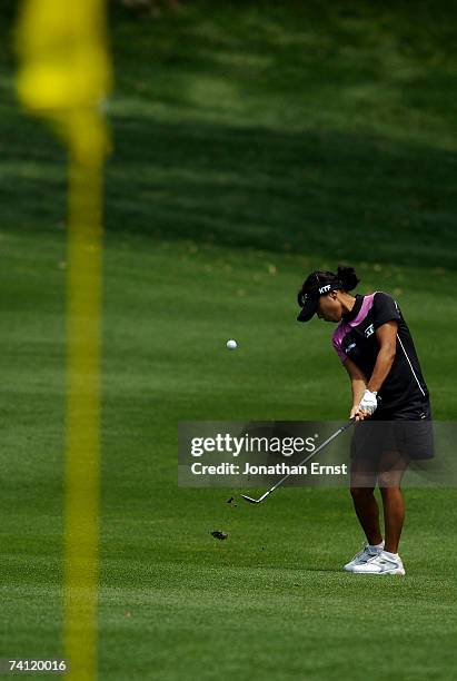 Mi Hyun Kim of South Korea hits her approach to the 15th green in Round 1 of the LPGA of the LPGA Michelob Ultra Open at Kingsmill May 10 in...
