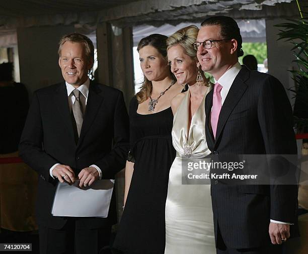Johannes B. Kerner and his wife Britta Becker-Kerner and Kai Dikmann and his wife Dr. Katja Kessler attend the Goldene Feder Awards at the...