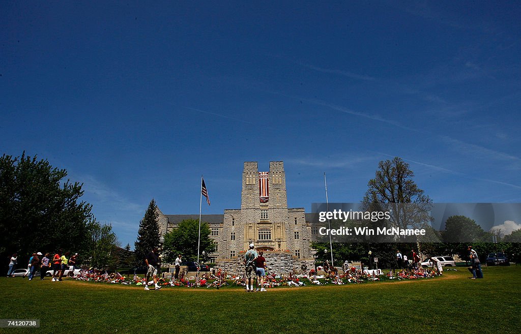 Virginia Tech Rip Visitors pay their respects at a memorial to the 32 students and ...