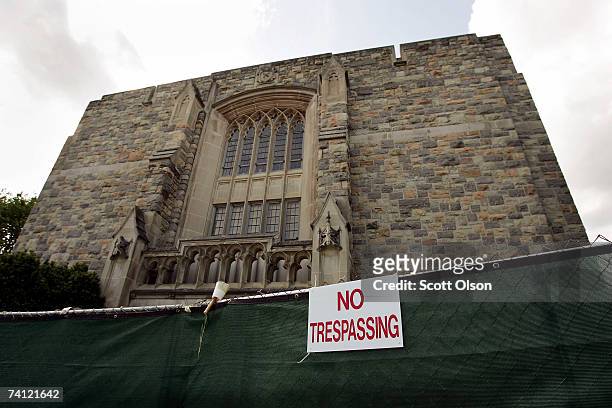 Fence surrounds Norris Hall on the campus of Virginia Tech where 31 people were killed last month May 10, 2007 in Blacksburg, Virginia. Cho...