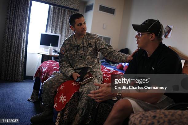 Army Chaplain Roger Benimoff, a 34 year old protestant Chaplain from Texas does his rounds with outpatient vets on the Walter Reed Campus, April 26,...