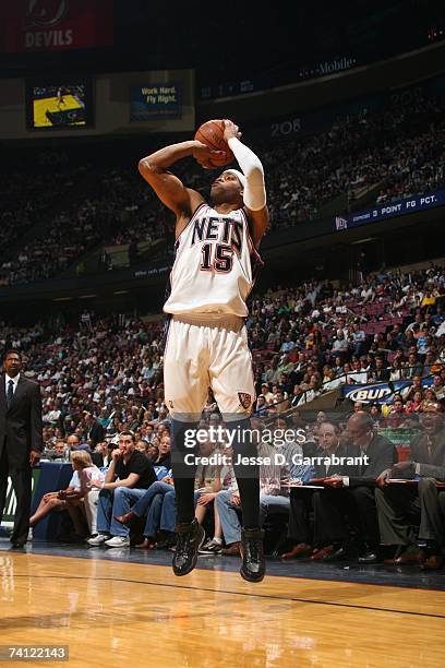 Vince Carter of the New Jersey Nets shoots a jump shot against the Toronto Raptors in Game Six of the Eastern Conference Quarterfinals during the...