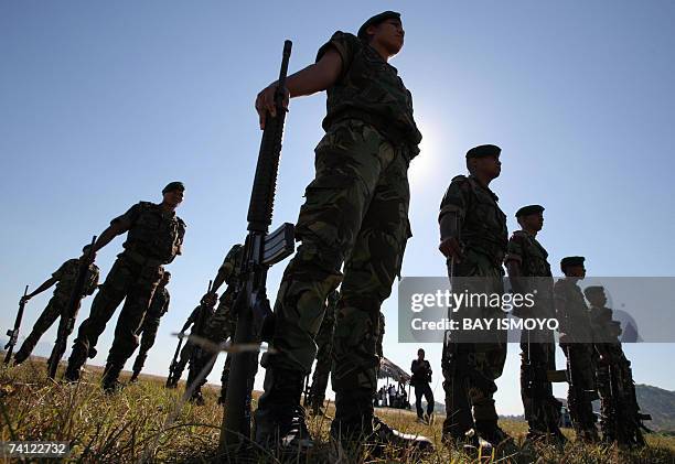 East Timorese soldiers line up during a ceremony in Dili, 11 May 2007 as the country is expecting the official results of its elections in which...