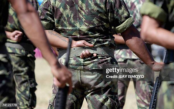 East Timorese troops line up during a ceremony in Dili, 11 May 2007 as the country is expecting the official results of its elections in which Nobel...