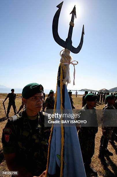 East Timorese soldiers line up during a ceremony in Dili, 11 May 2007 as the country is expecting the official results of its elections in which...