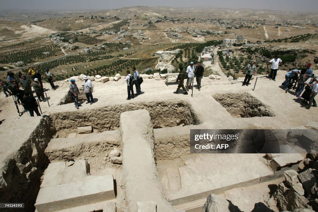 Journalist gather around the base of wha...