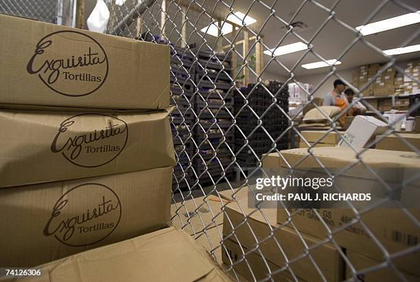 Raymondville, UNITED STATES: Kitchen staff prepare meals for the detainees inside Homeland Security's Willacy Detention Center, a facility with 10...