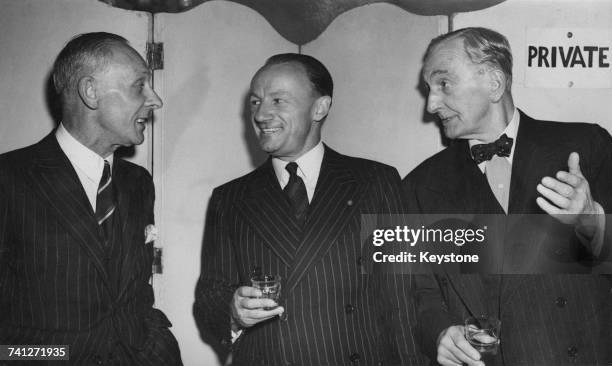 Cricketers Jack Hobbs , Don Bradman and C. B. Fry at a luncheon held at the Grosvenor House Hotel, London, 20th April 1948. They are guests of the...