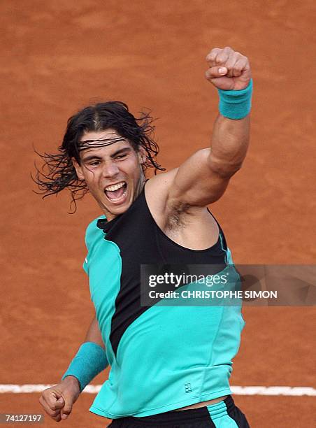 Spain's Rafael Nadal jubilates after he won against his opponent Serb Novak Djokovic during his quarter final at the Rome's Italian open 11 May 2007....